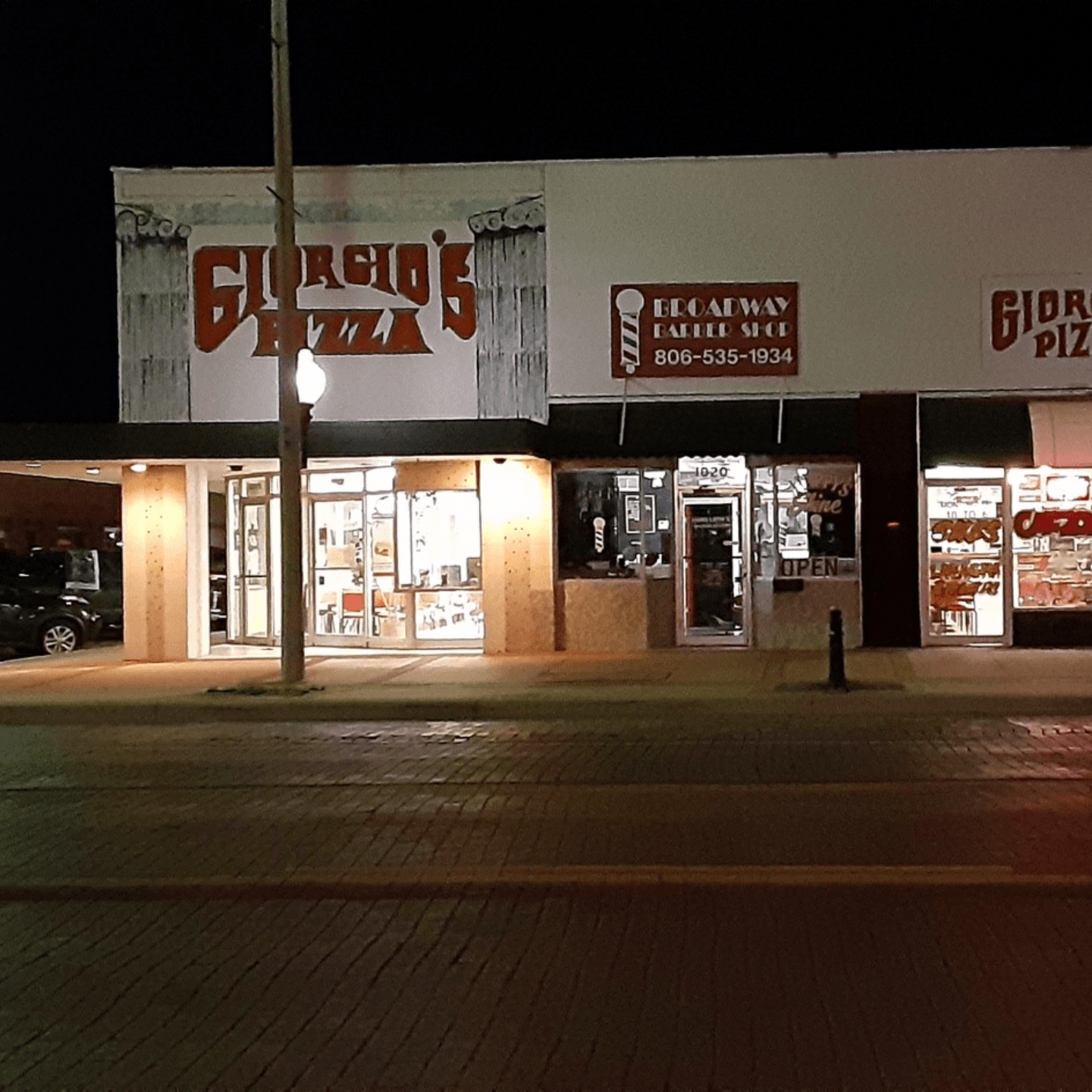 Feast with Friends: Experience the Epic 'Texas Sized Pizza' at Giorgio's