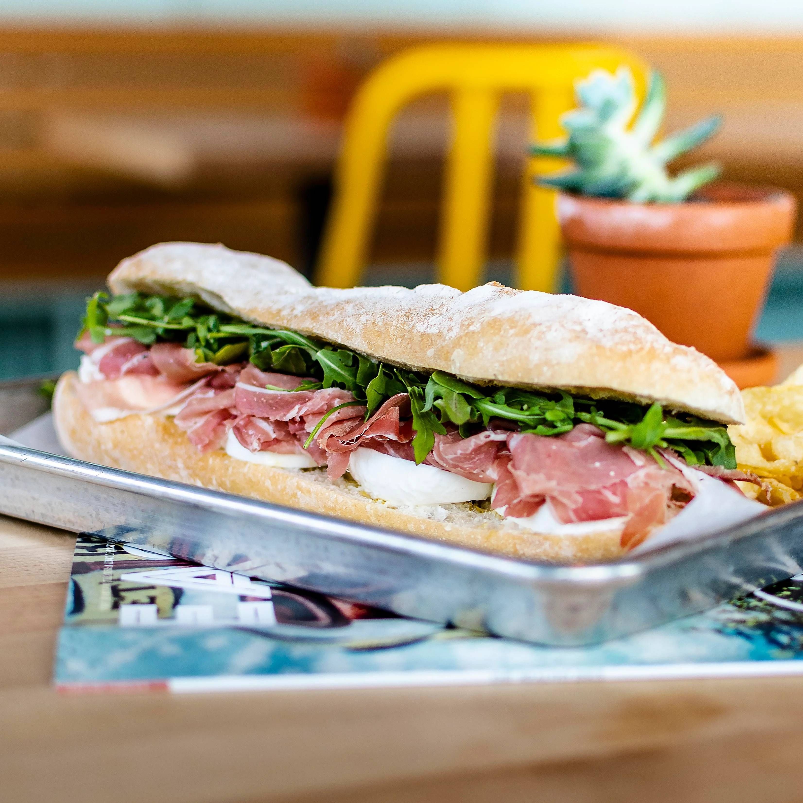 PROSCIUTTO SANDWICH WITH FRIES.