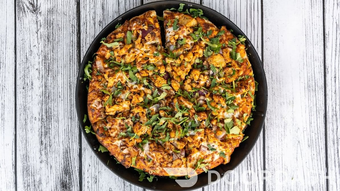 Spicy Butter Chicken Pizza.