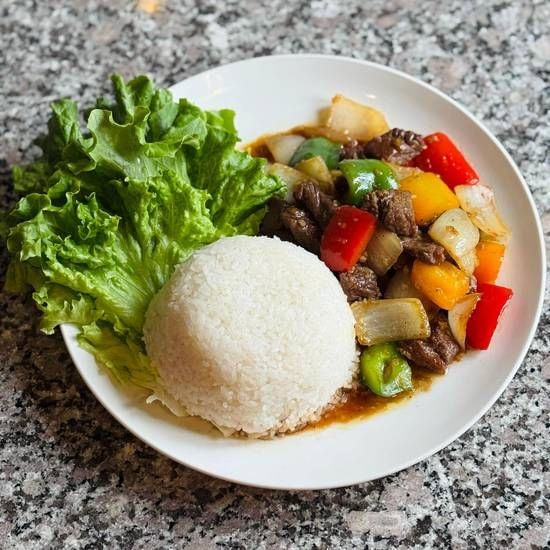 Vietnamese shaking beef ( Cơm Bò Lúc Lắc).