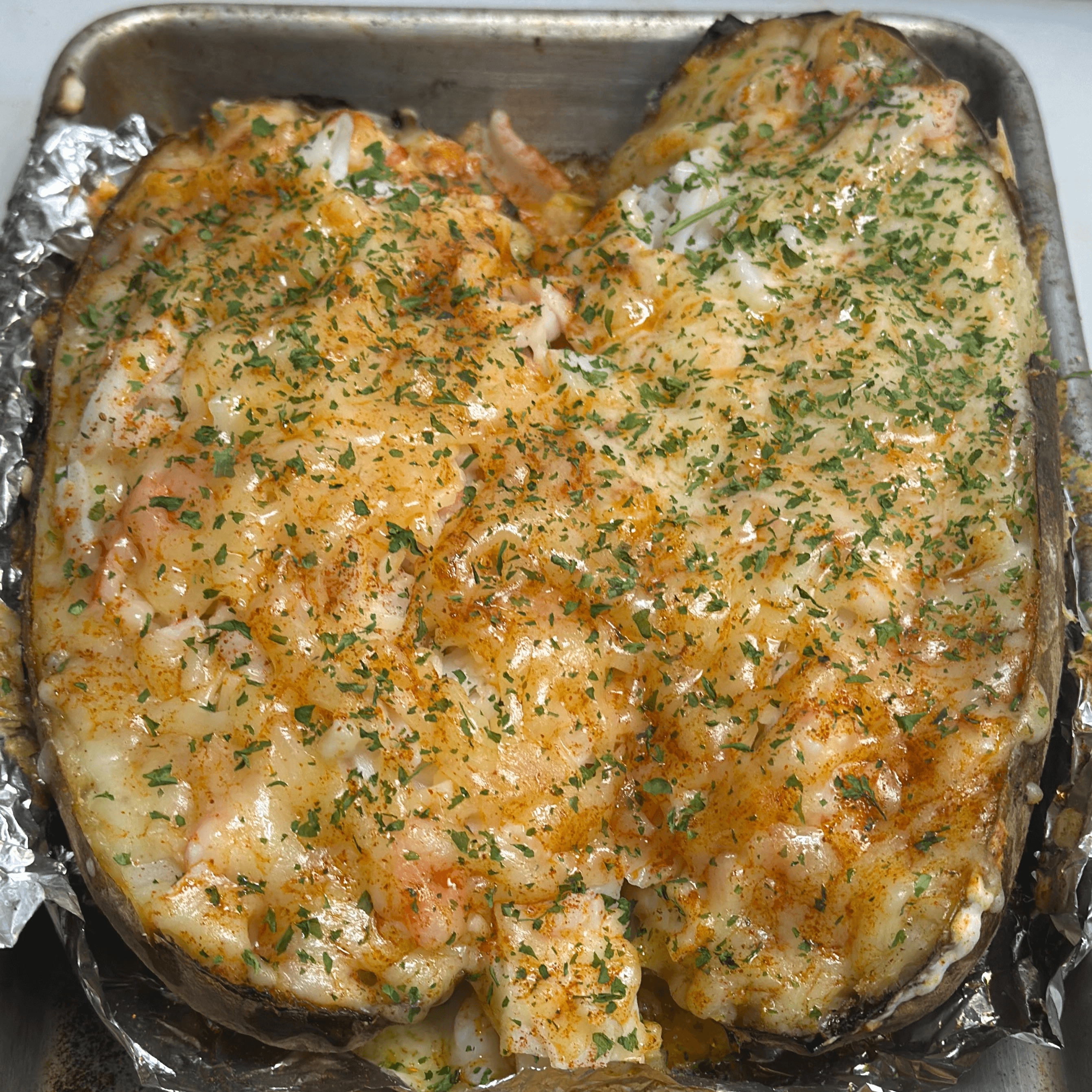 Seafood loaded baked potatoes.
