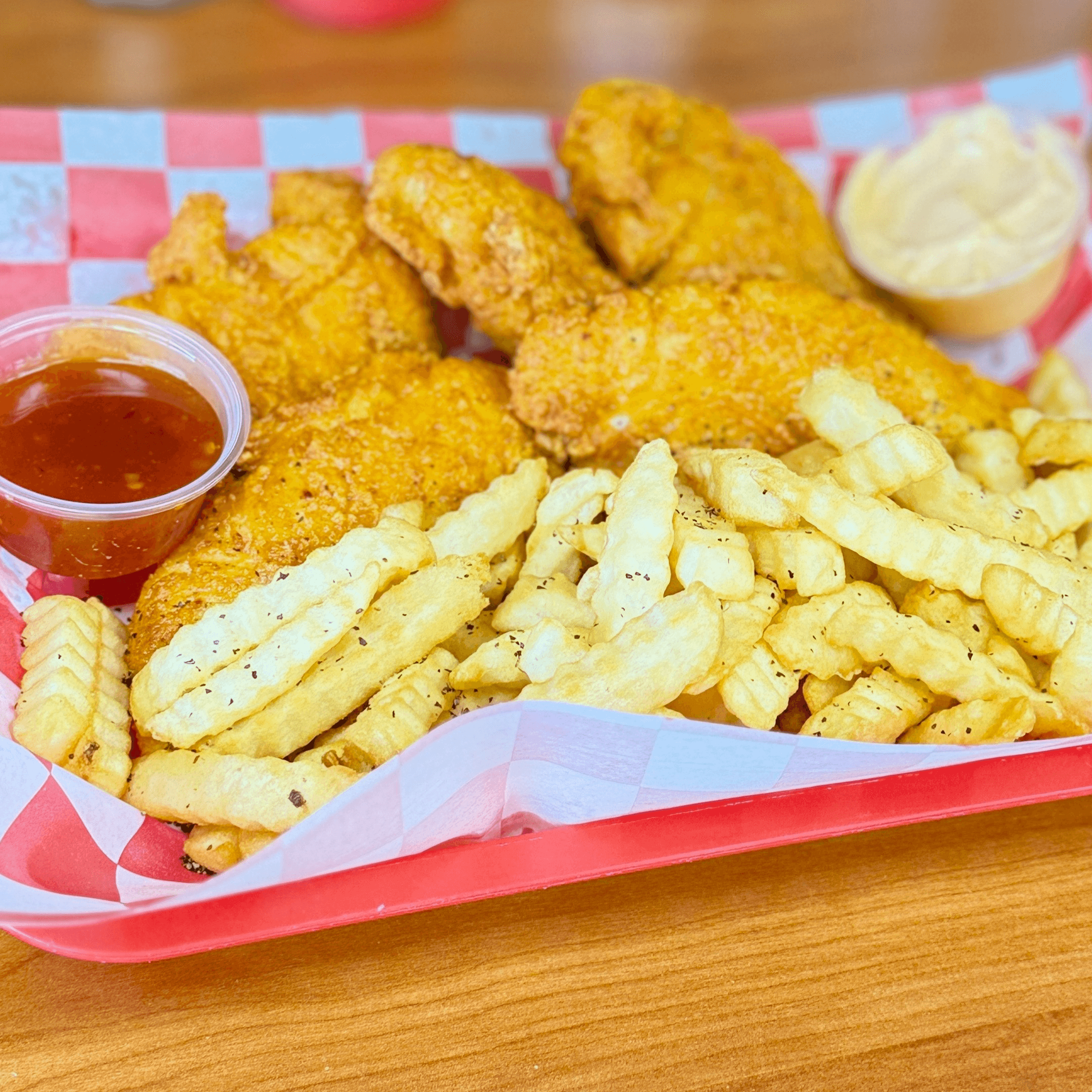 Milan's Crispy Chicken Strips with Fries.