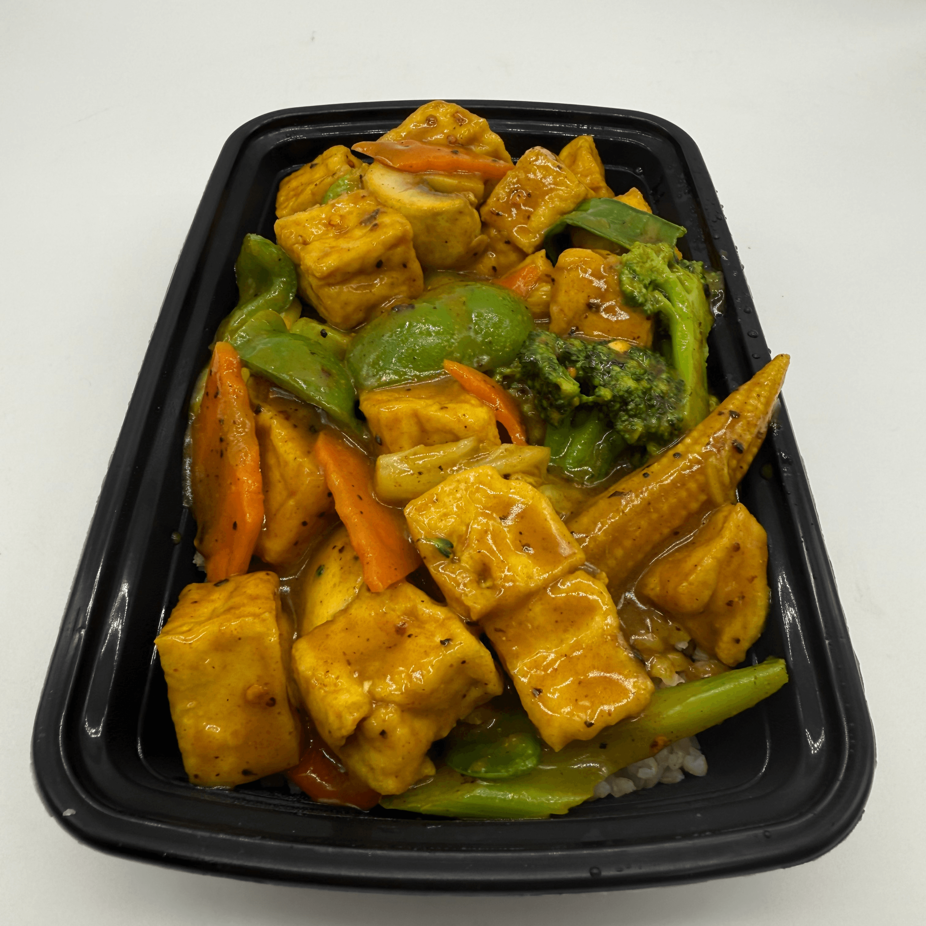 Tofu with Veggies in Curry Sauce.