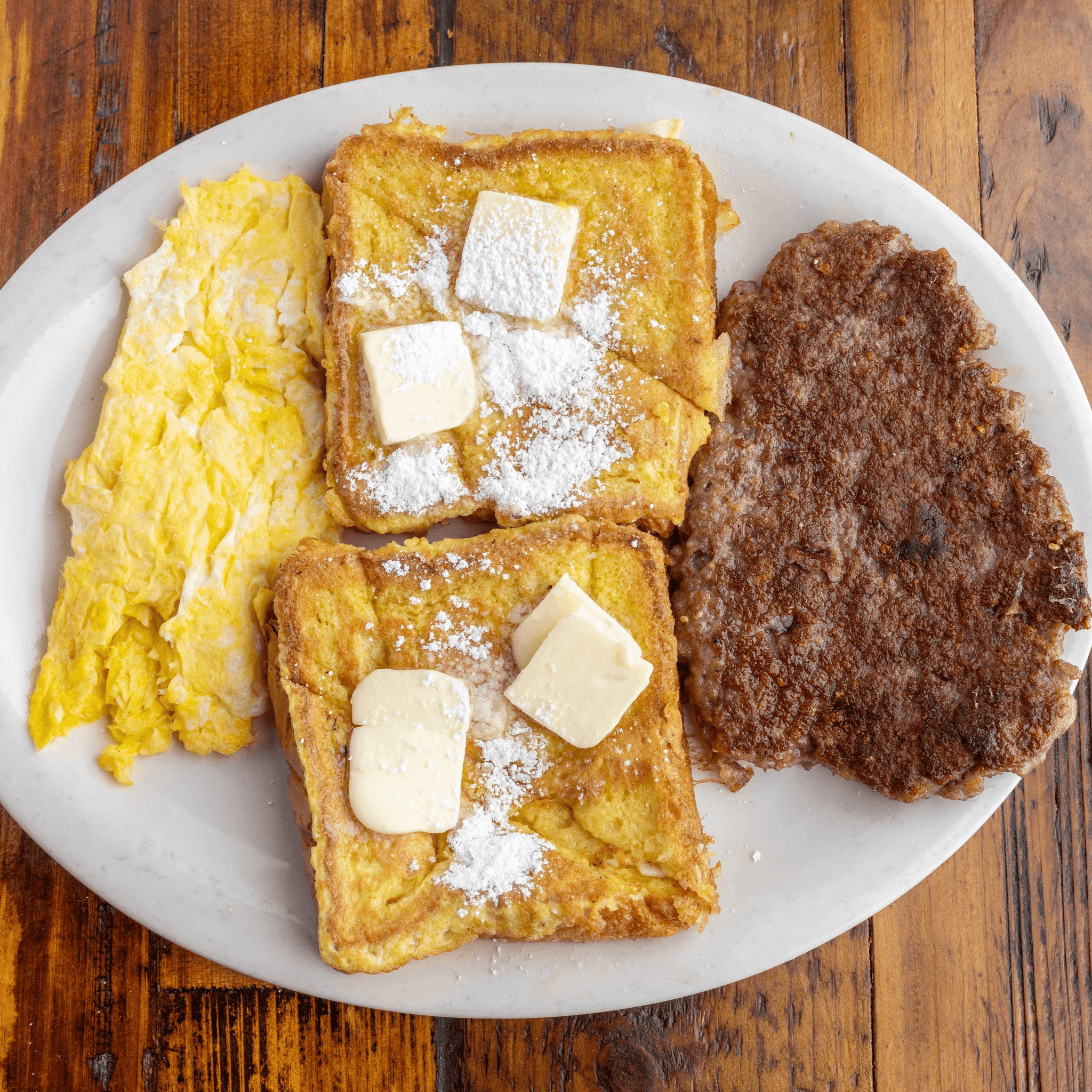 French Toast with Meat and 2 Eggs.