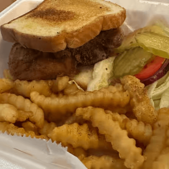 Pork Chop Sandwich with Fries.
