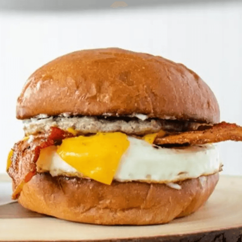 Bacon, Sausage, Eggs-N-Cheez Sandwich.