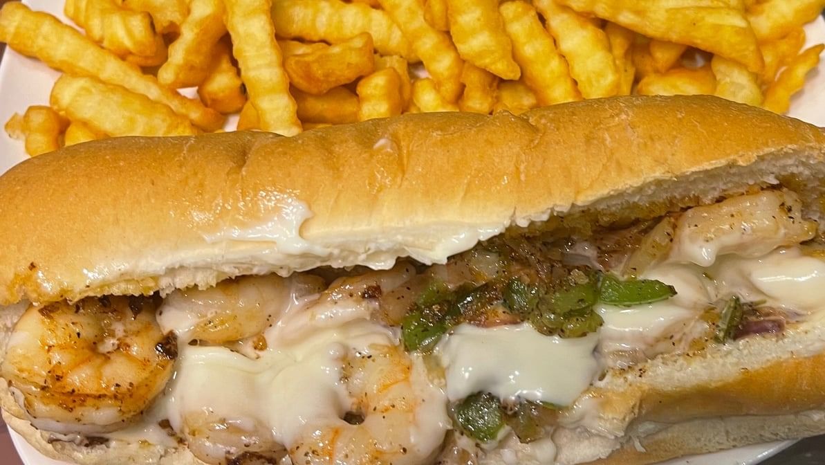 # 26 GRILLED SHRIMP SANDWICH.