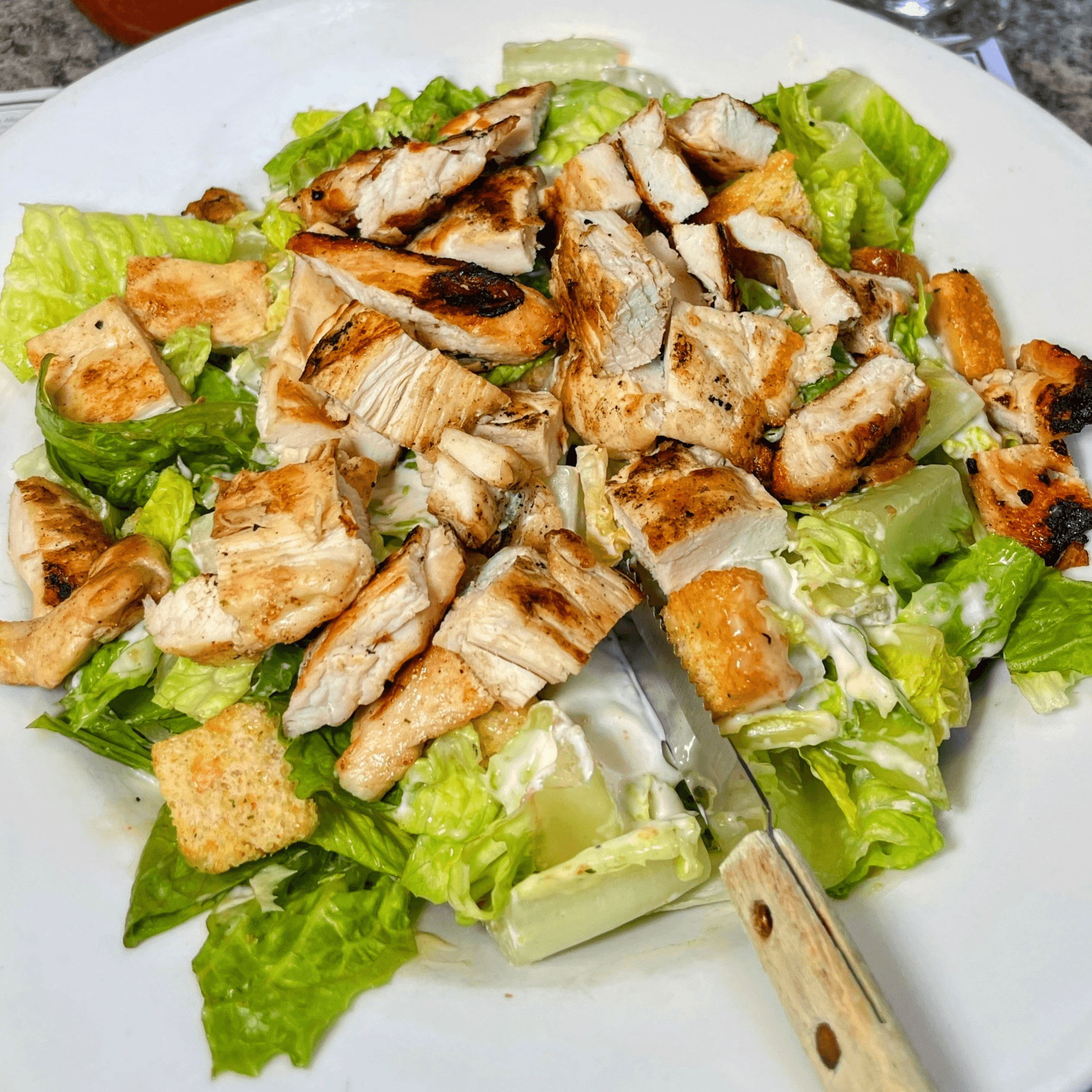 Caesar Salad with Grilled Chicken.
