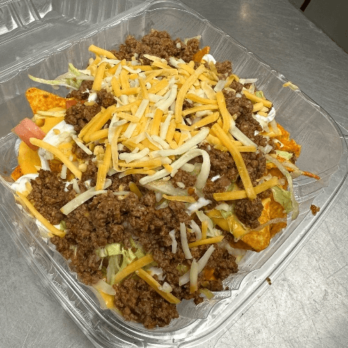 Chicken, Steak or Ground Beef Nachos.