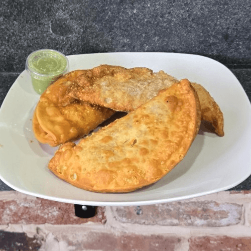 Buy 2 veggie empanadas and get a 3rd for free!.
