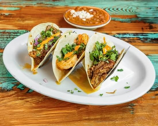 Three Flour Tacos Jalisco Style.