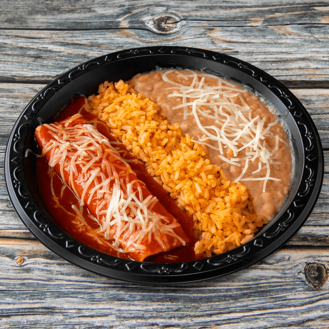 Kids Cheese Enchilada with Rice and Beans.