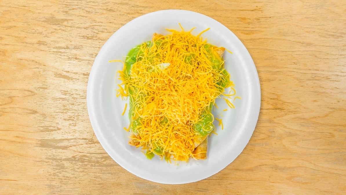 3 Rolled Tacos with Cheese & Guacamole.