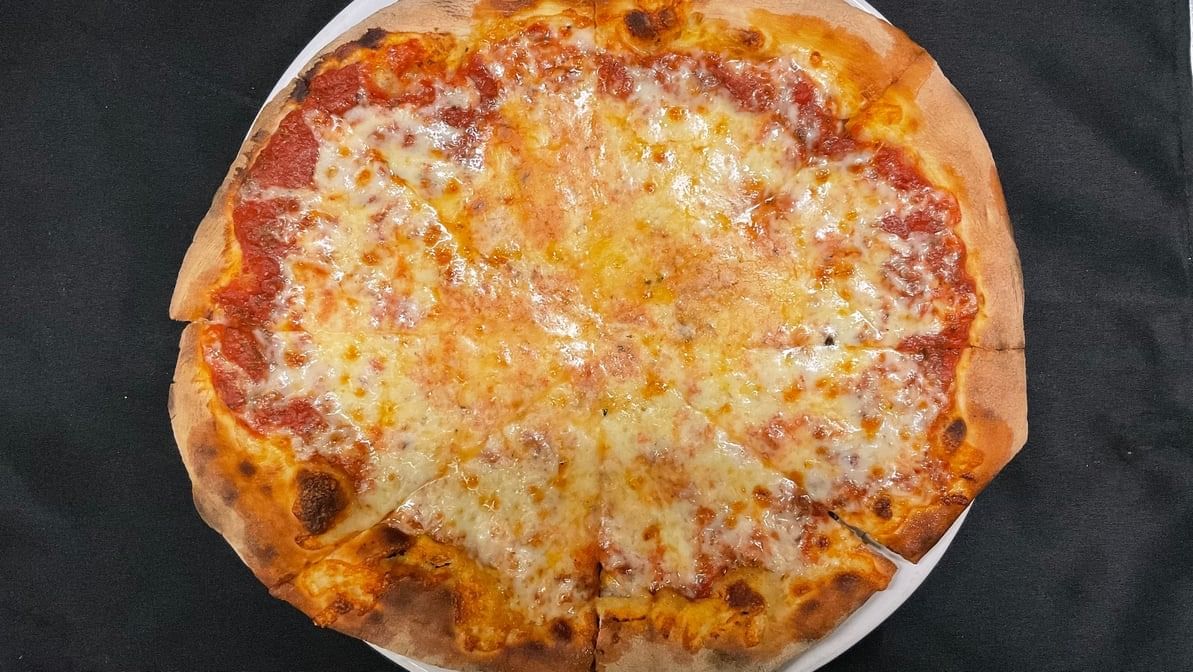 Riley’s Original Neapolitan Wood Fired Brick Oven Pizza.