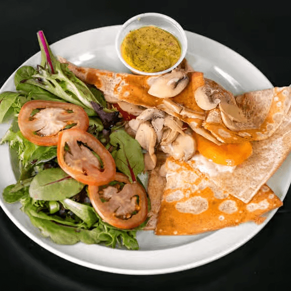Goat Cheese, Mushroom, and Tomato Crepe.