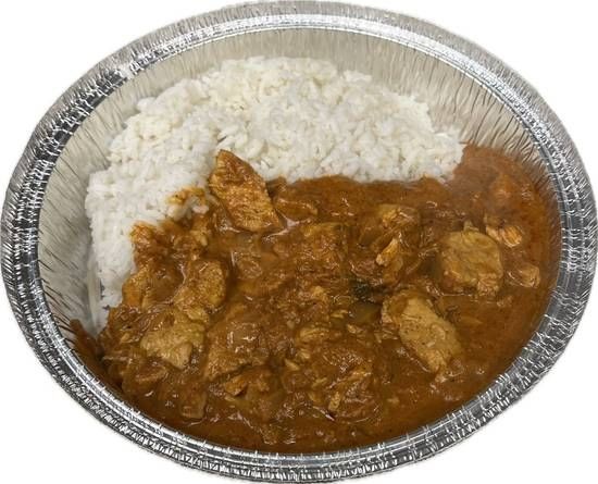Chicken Tikka Masala Over White Rice and Grilled Veggies.