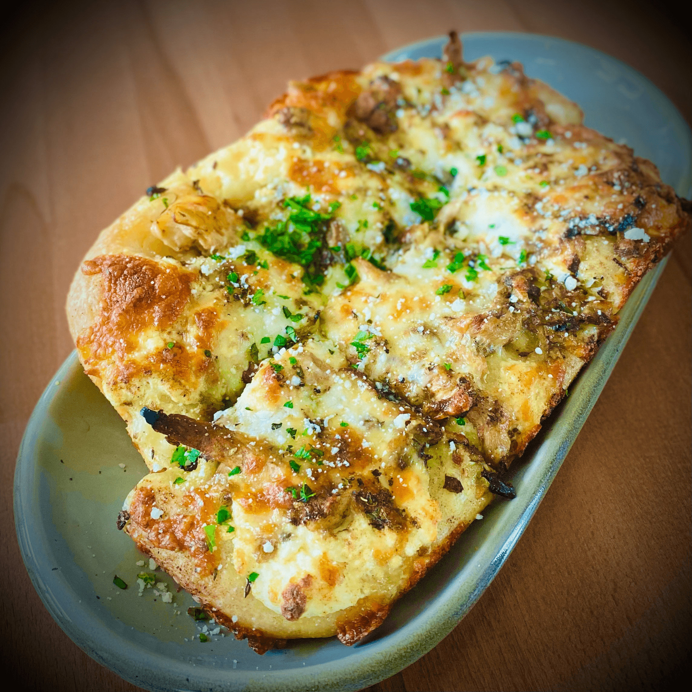 Tray of Mushroom Bianca Pizza.