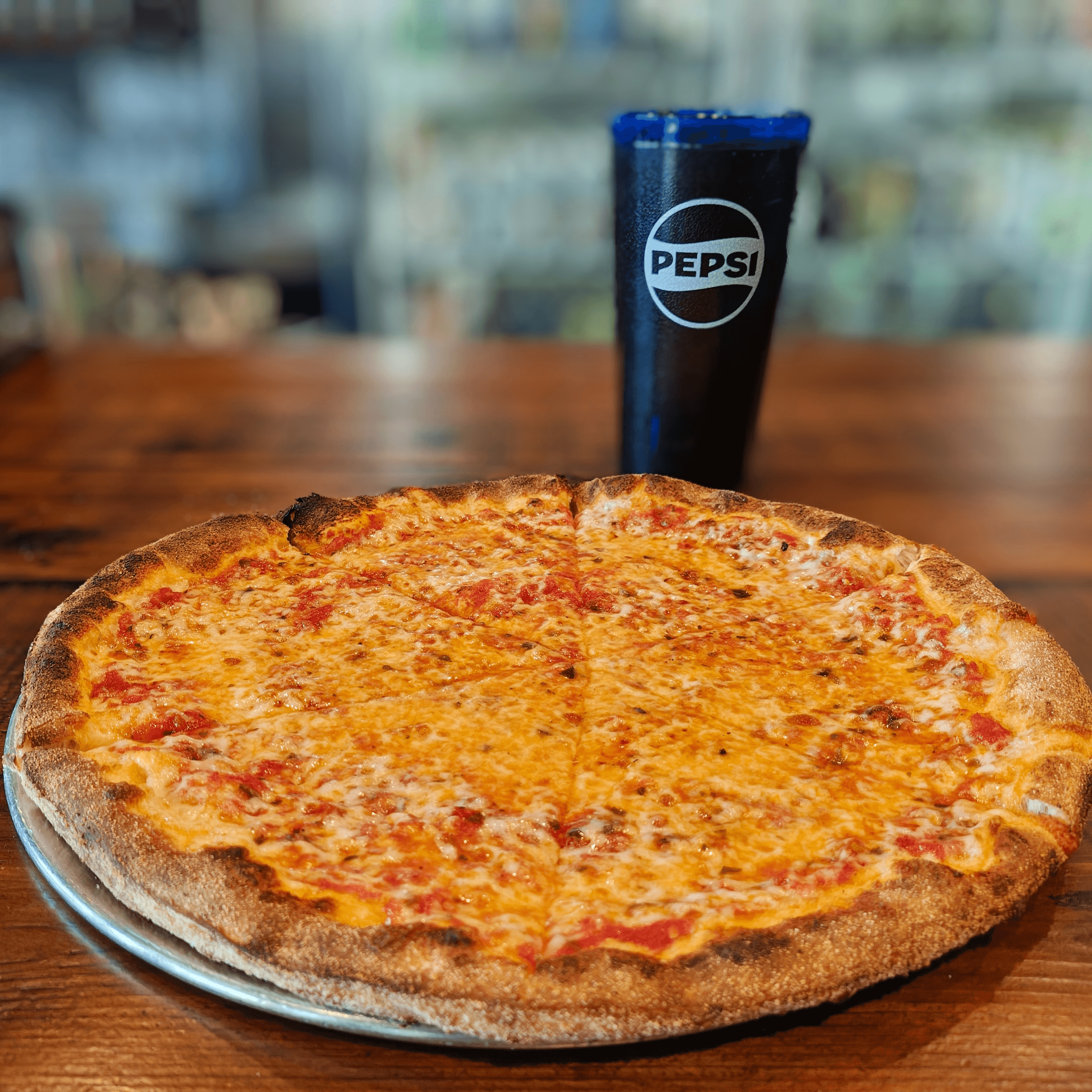 The New Yorker Pizza (Traditional Cheese Pizza).