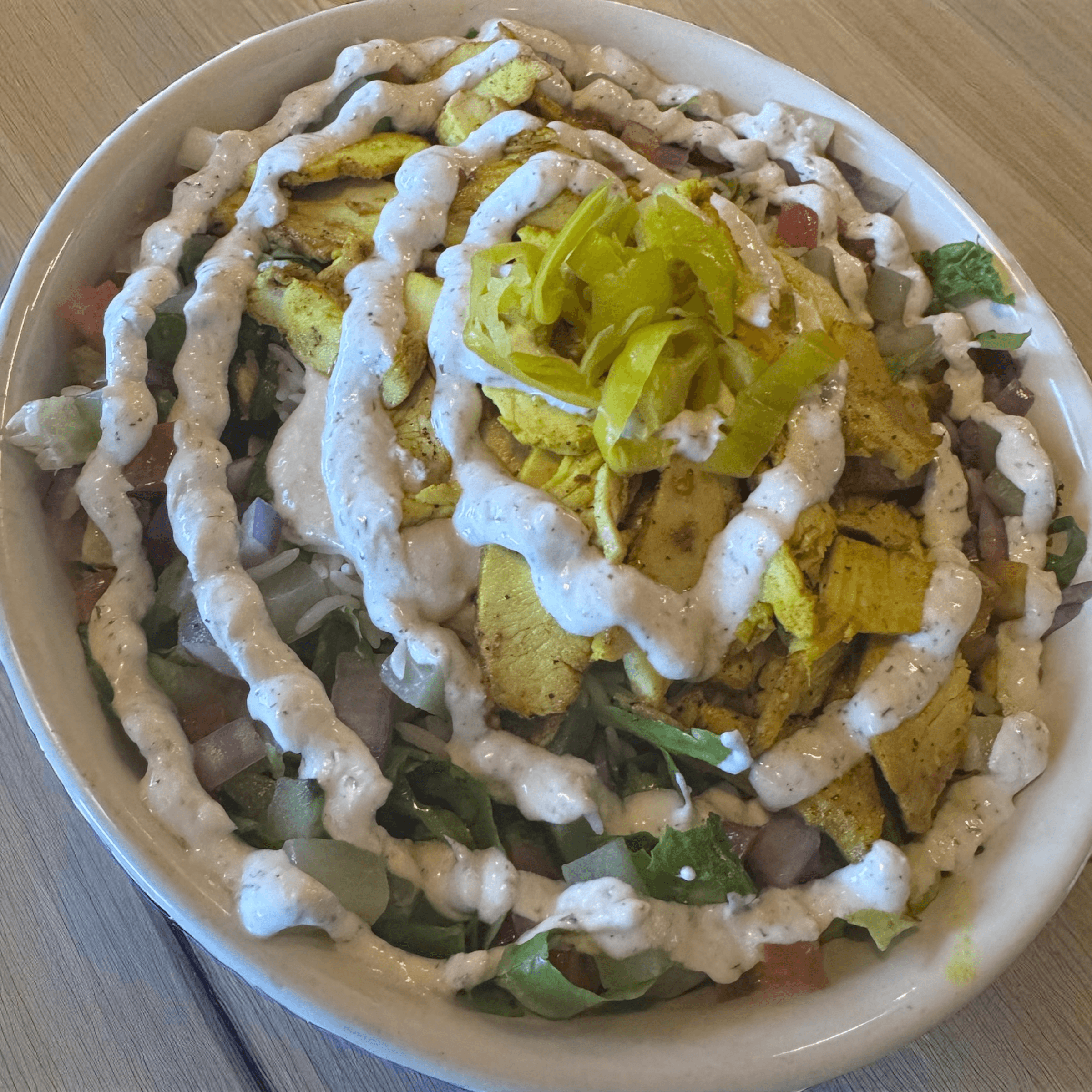 Chicken Shawarma Bowl with hummus.