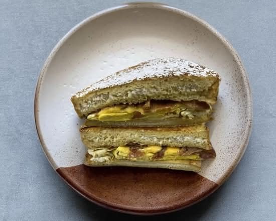 French Toast Holy Moly Stuffed with Bacon Eggs & Cheese.