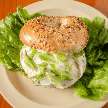 A bagel with low fat vegetable cream cheese.