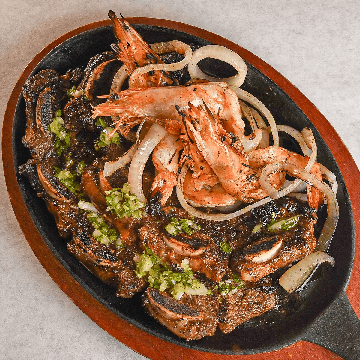 Baked Beef Ribs with Shrimps / Costillas de Res Mar & Tierra.