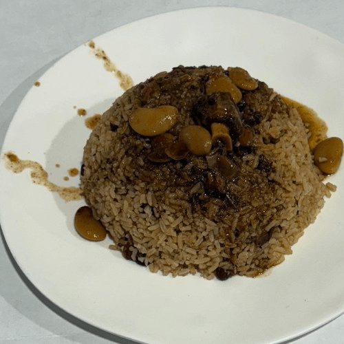 Rice and Peas w/ Oxtail Gravy.