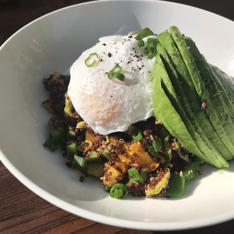 Red Quinoa Brunch Bowl with Poached Eggs & Avocado.