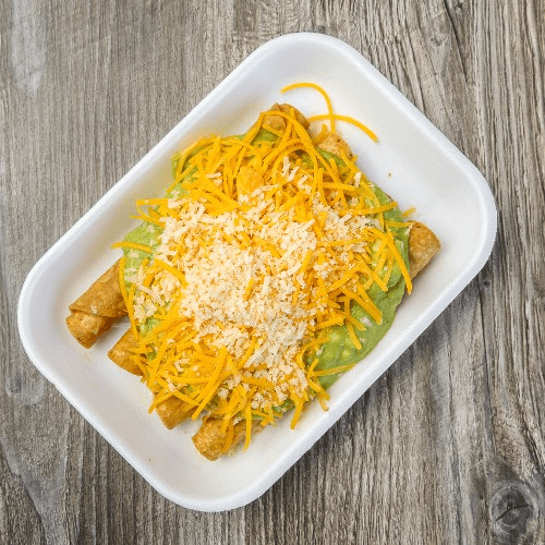 3 BEEF ROLLED TACOS GUACAMOLE.