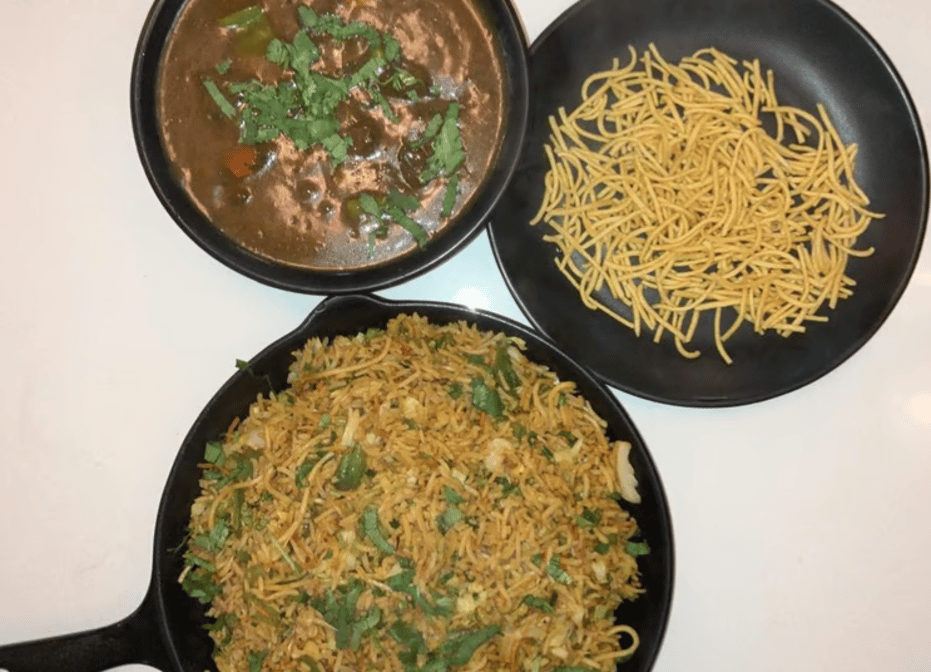 Triple Schezwan Fried Rice (Includes Veg Manchurian Gravy).