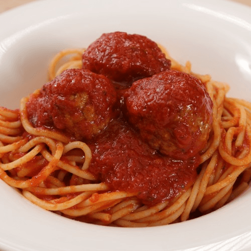 Spaghetti with 8 meatballs.