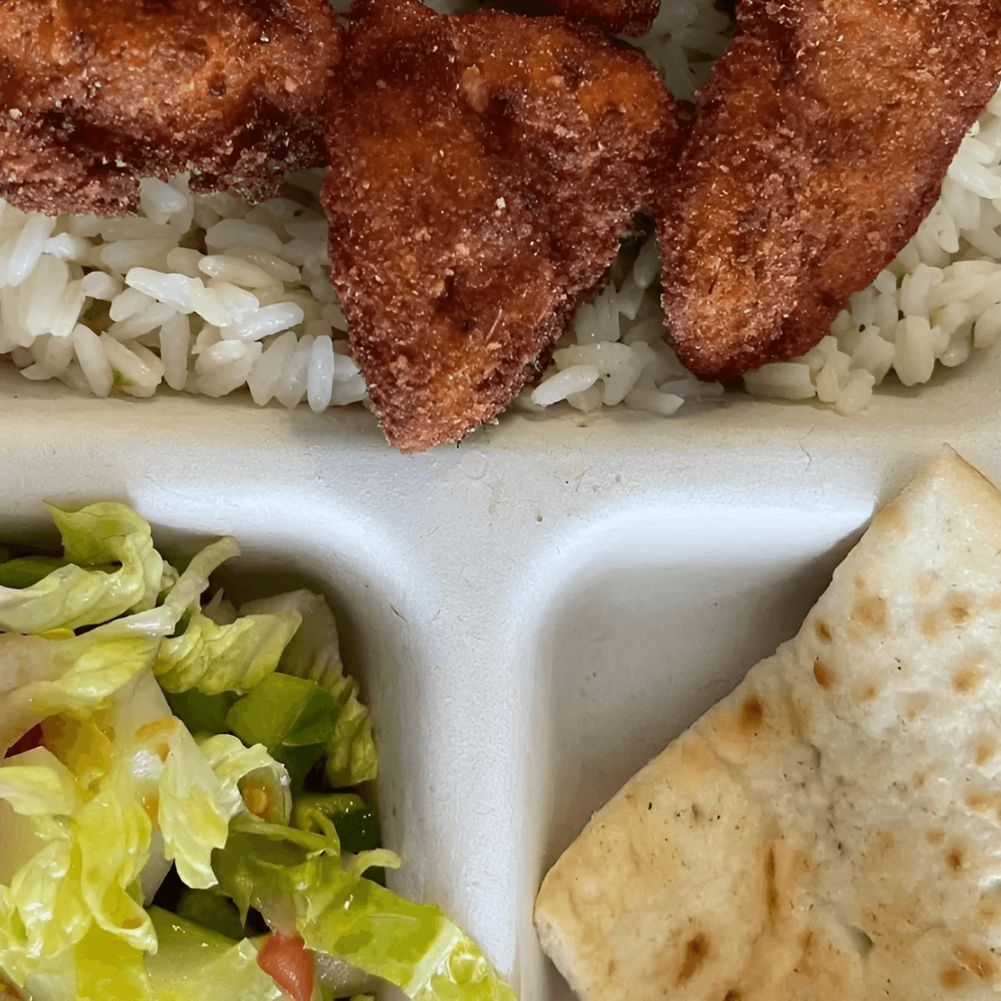 Chicken Bites with Salad, Pita and Rice