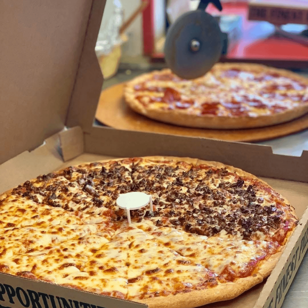 Buy 2 Lg Cheese Get 1 Free.