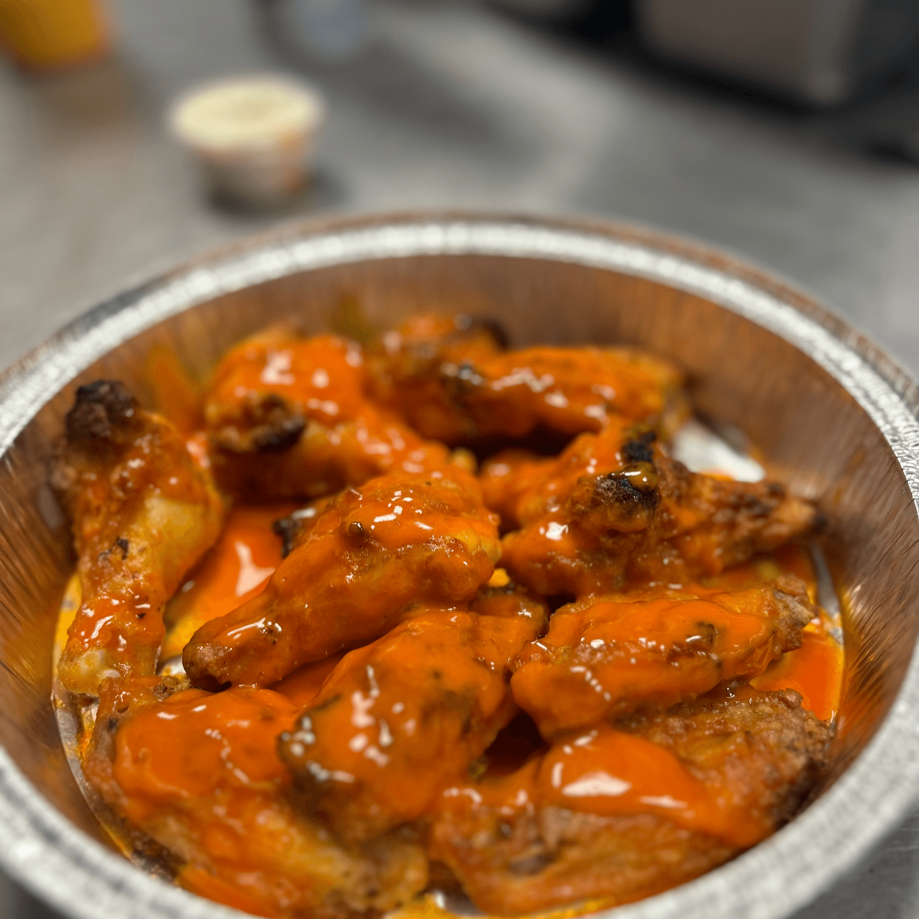 Baked Jumbo Sized Wings (10)- Lightly Breaded.