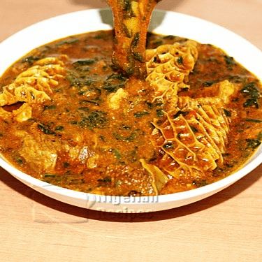 Ogbono soup w/ Fufu and assorted meats..