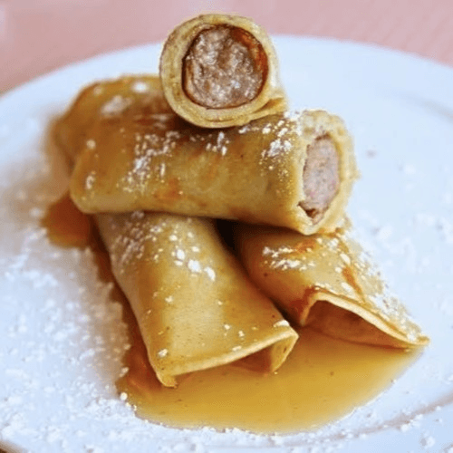 Pigs in a Blanket, sausage links wrapped in our Swedish Pancakes