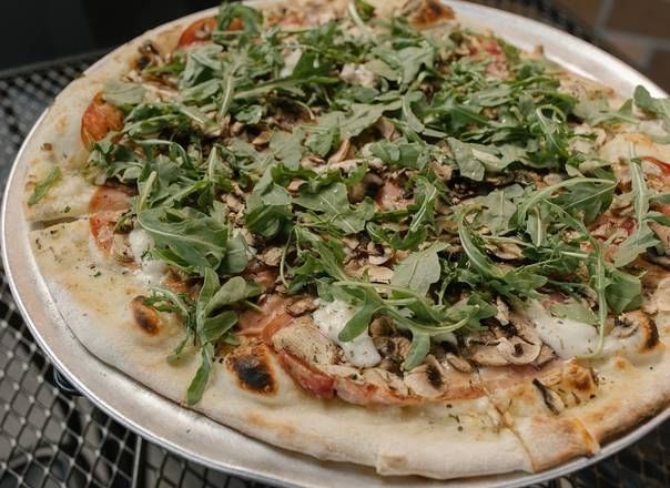 Prosciutto Arugula Pizza.