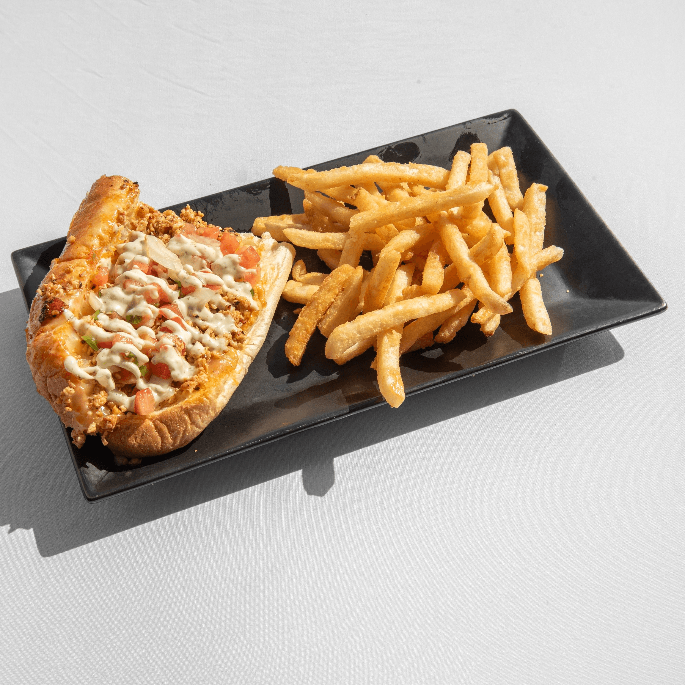 Caribbean Cheesesteak + Fries.