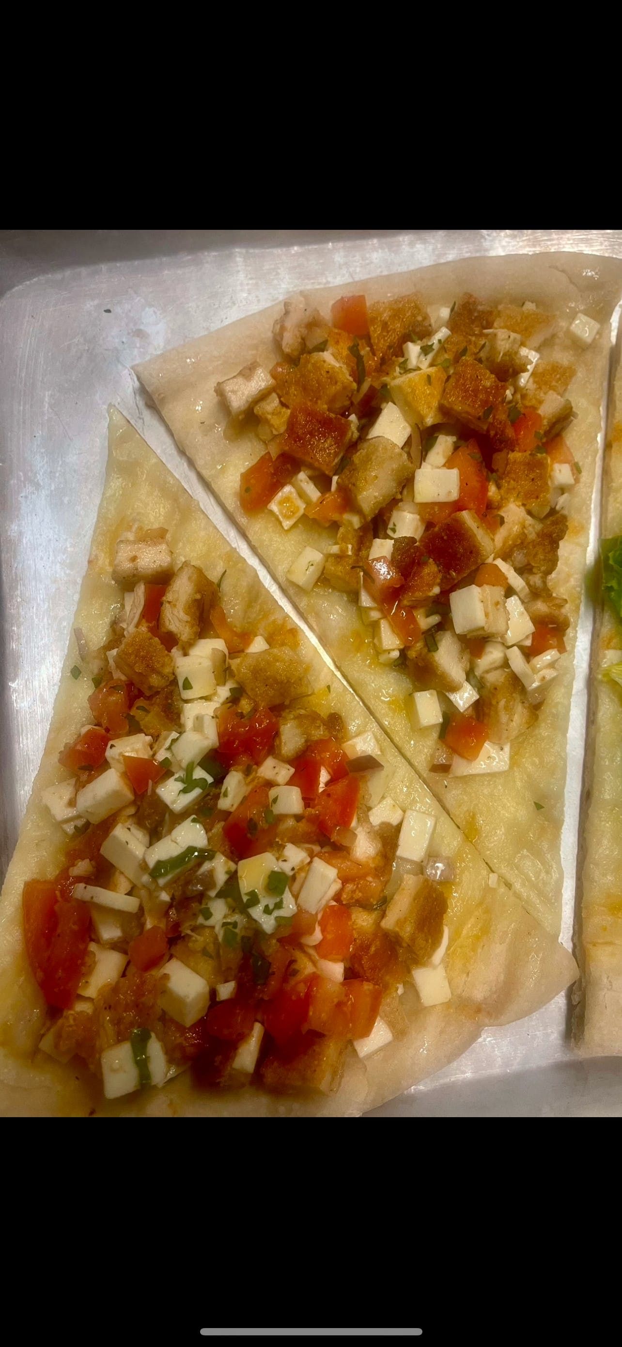 Chicken Bruschetta Pizza Slice.