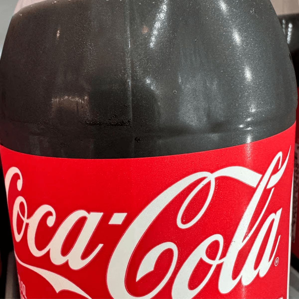 Coke Regular Bottle.