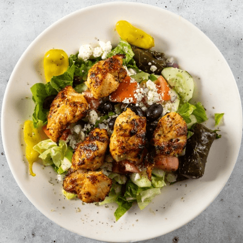 Chicken Souvlaki Over Greek.