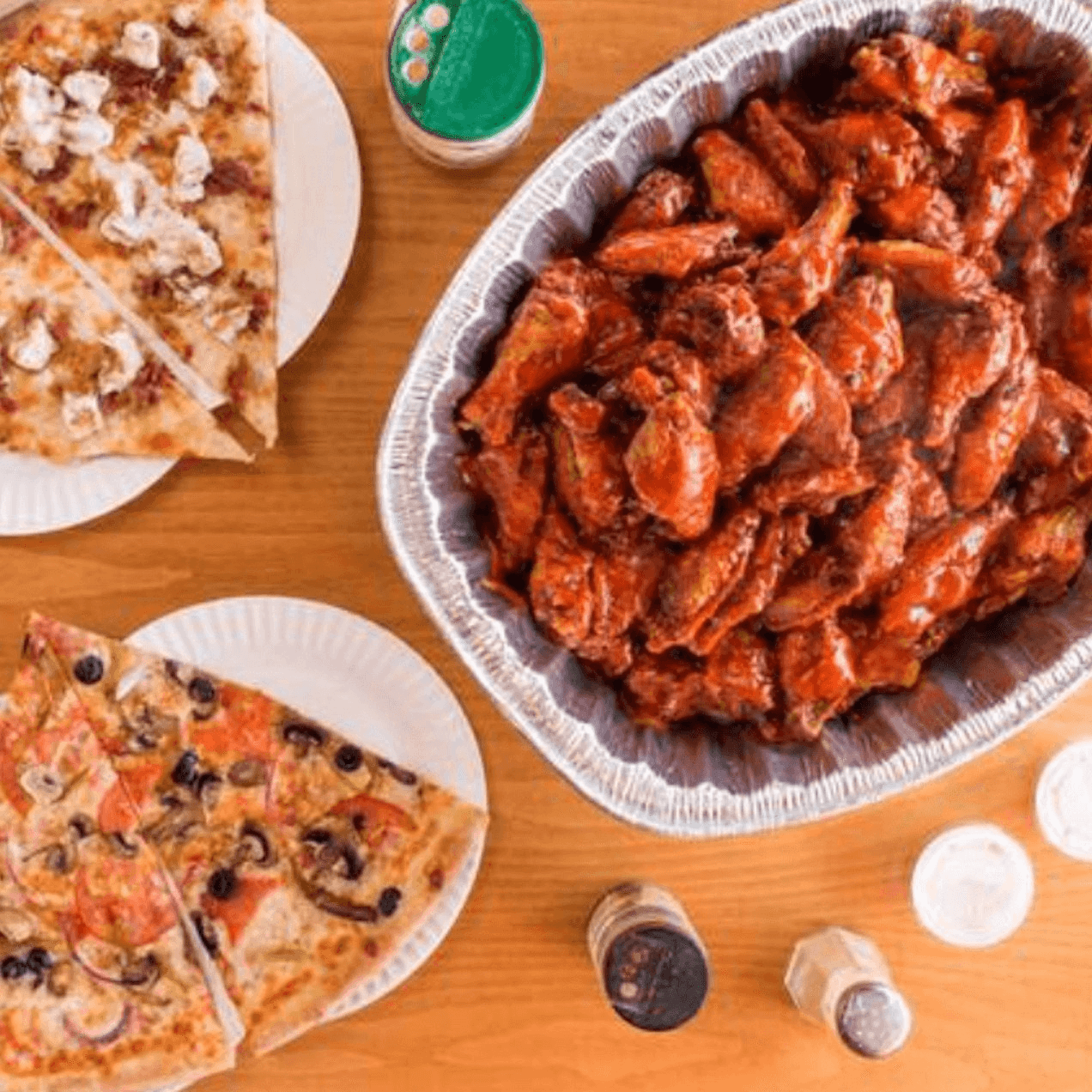 3 Large Cheese Pizzas, 50 Wings, a 2-Liter Soda, and Garlic Knots.