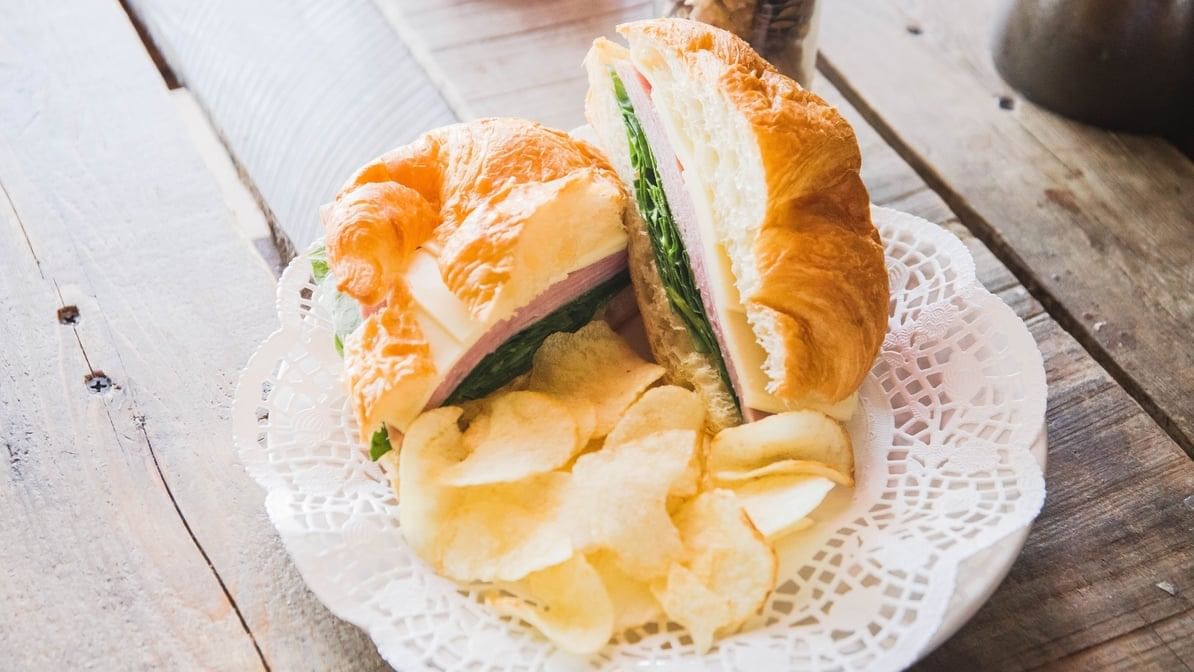 Ham or Turkey & Cheese Croissant Sandwich.