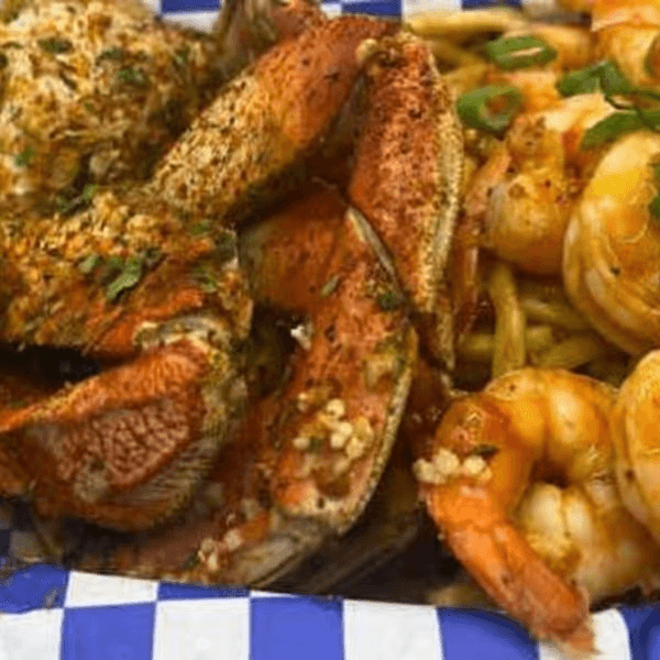 "California Love" Crab & Shrimp with Garlic Noodles.