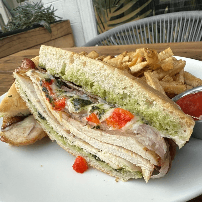 Roasted Chicken Sandwich with mixed greens salad.