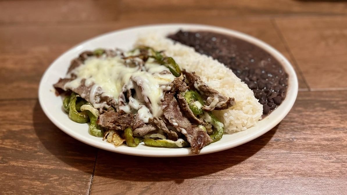 Alambre De Res / Steak Sautéed with Onions and Peppers Melted Cheese.