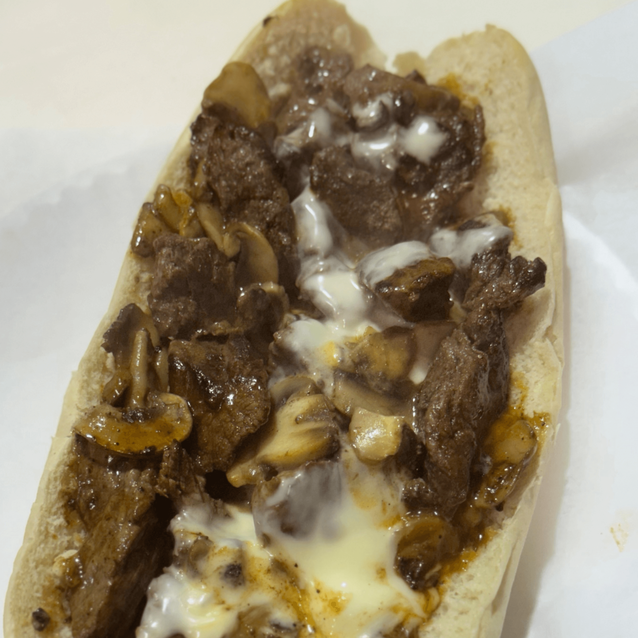 Steak Tips with Mushrooms, Cheese and BBQ Sauce.