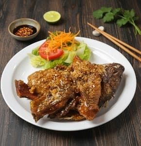 Fried Tilapia with Garlic Pepper sauce.