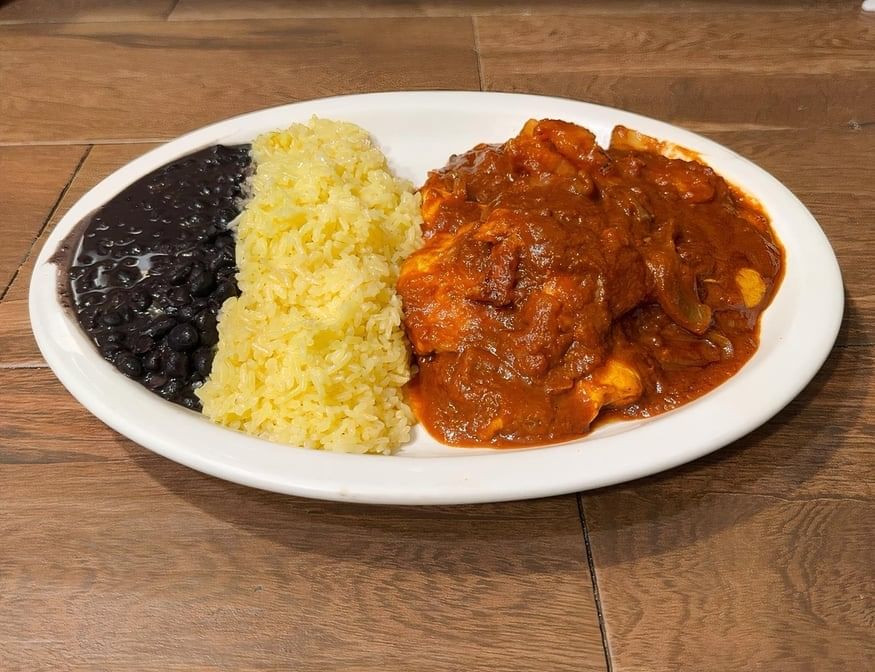 Pollo Entomatado / Chicken Breast Sautéed Tomatoes and Onions.