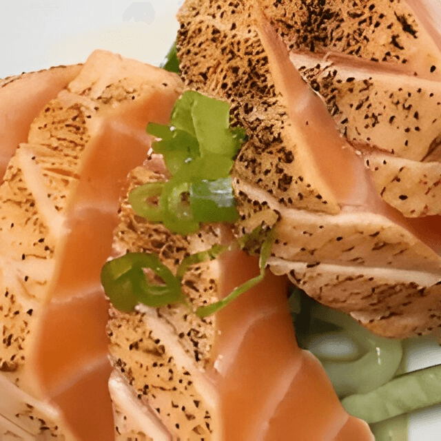 Seared Peppered Salmon Sashimi.